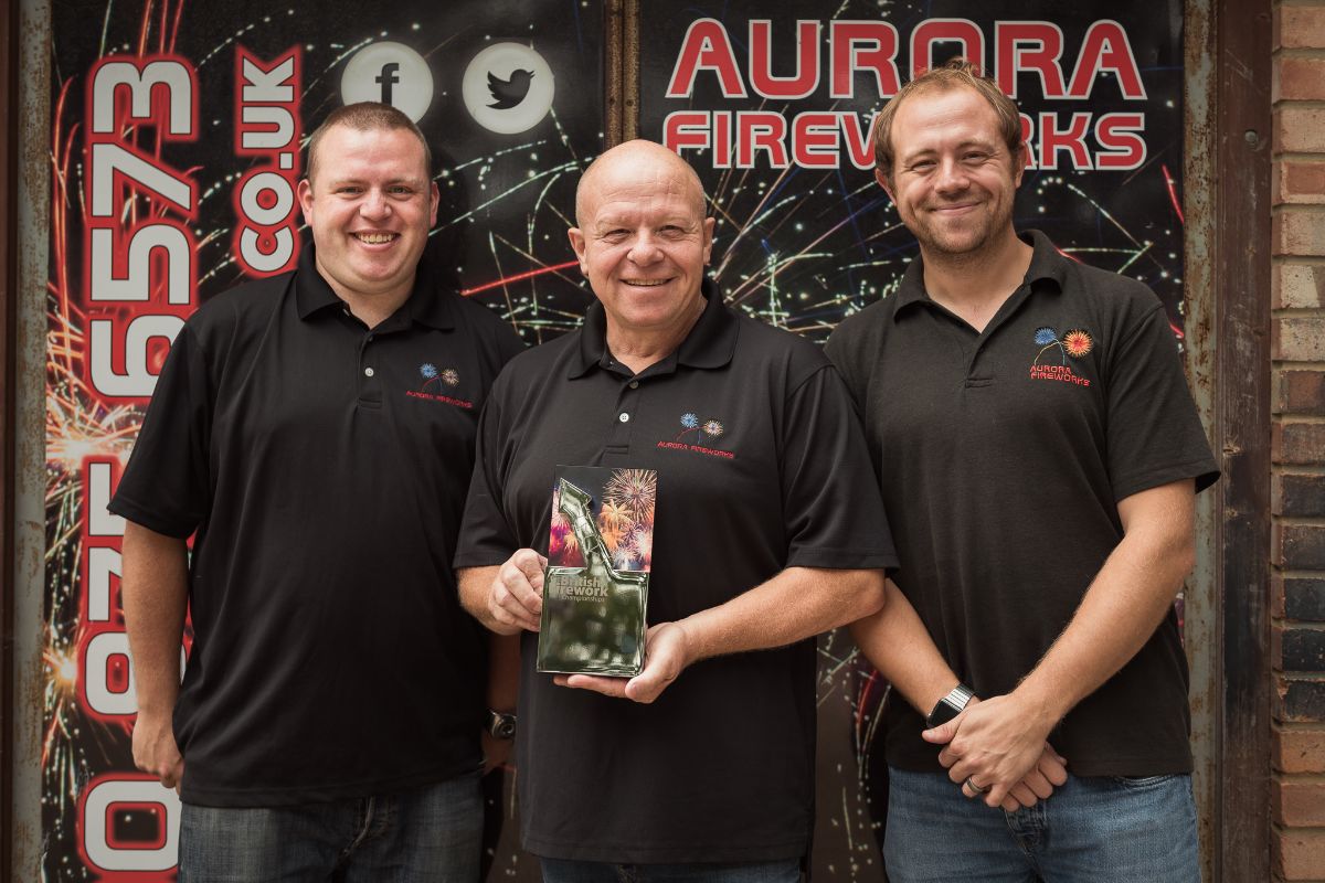 Image for Rob with sons Jason (left) and Stephen (right) with the British Fireworks Championships trophy 2021 