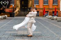 Image for Swinging in love on their wedding day! 
